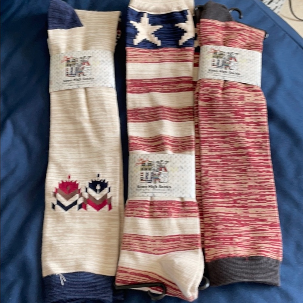 Three pairs of new knee high socks